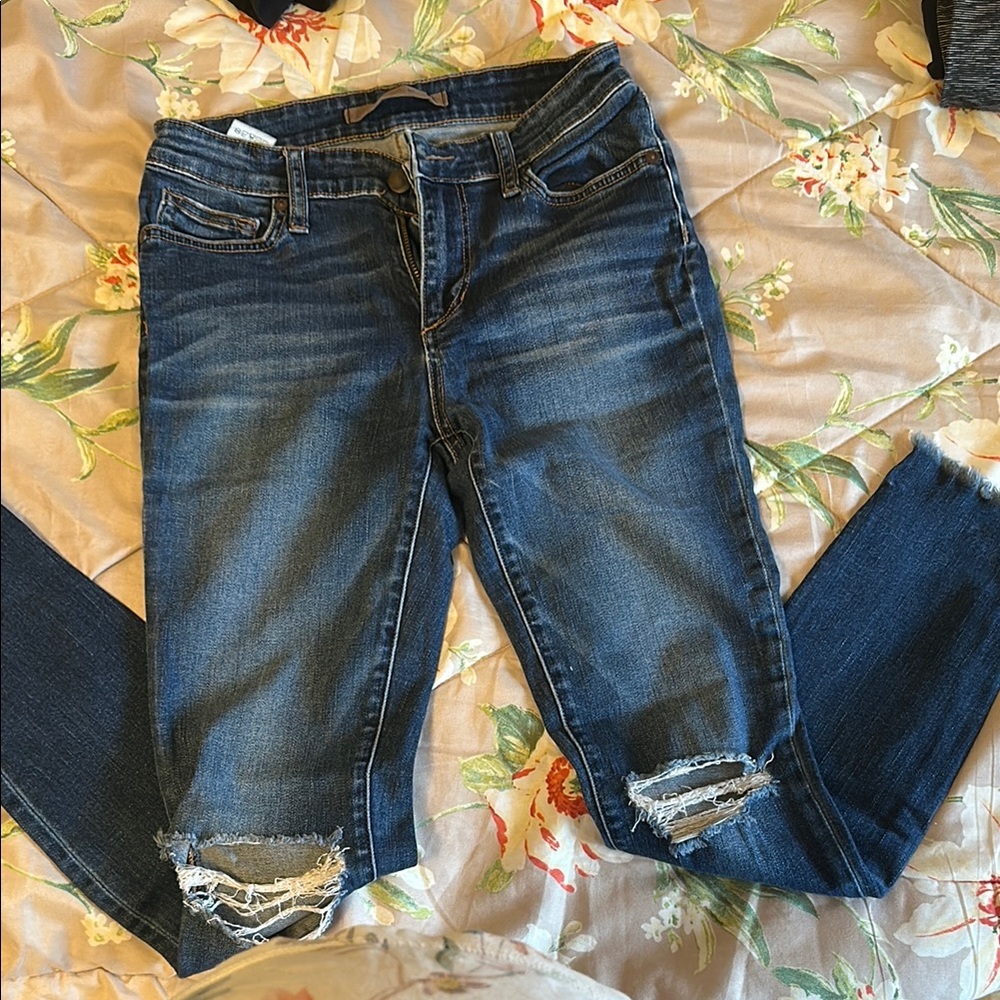 Women's Distressed Blue Jeans